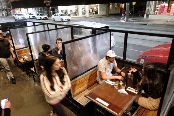 Diners sit down for a meal after midnight at Chapelli’s in Chapel Street.