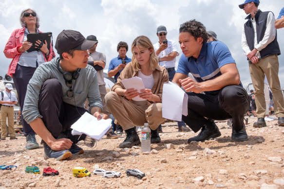 Director Lee Isaac Chung with Ramos and Edgar-Jones on the set of Twisters.