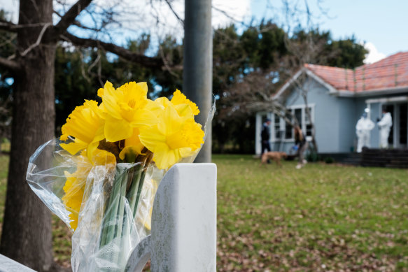 Flowers and police at the home of Shereen Kumar in Dural.