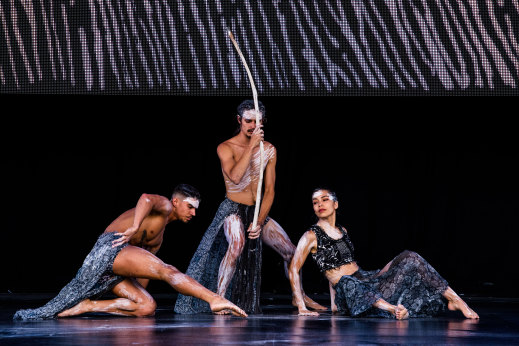 Bangarra dancers Kiarn Doyle, Bradley Smith and Rika Hamaguchi rehearsing at Barangaroo ahead of Wednesday's performance. 