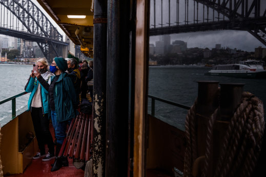 Passengers take in the final moments of the Queenscliff’s last journey on Wednesday. 