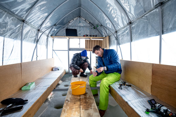 Inside the ice fishing tent.
