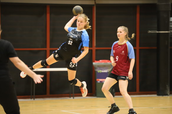 Elisabeth Gillespie competing at the UQ invitational last month. She enjoys the physicality – often seen in the leaping jumps – and team aspects of the sport.