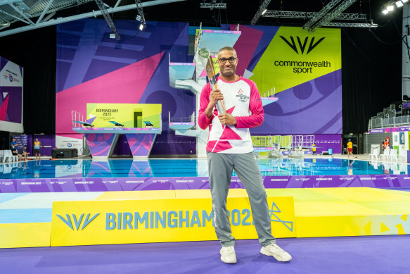 Richie Anderson takes part in The Queen’s Baton Relay as it visits Sandwell Aquatics as part of the Birmingham 2022 Queens Baton Relay in Birmingham on July 25.