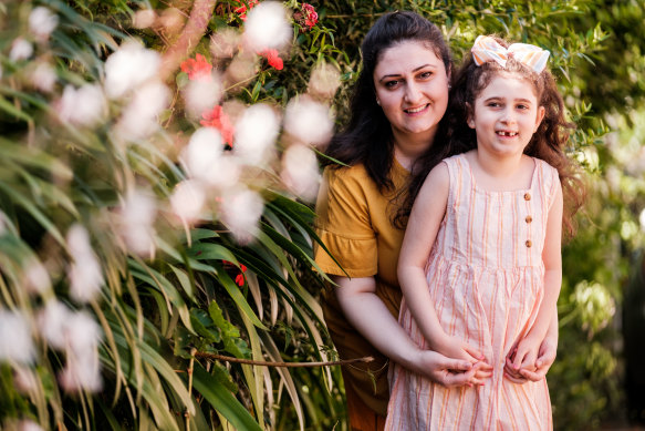 Dalal Baumgartner with her daughter Naomi, 7, who has a rare genetic condition