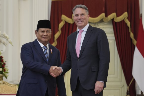 Indonesia’s newly inaugurated President Prabowo Subianto (left) greets Australia’s Deputy Prime Minister and Minister for Defence, Richard Marles, in Jakarta in October.