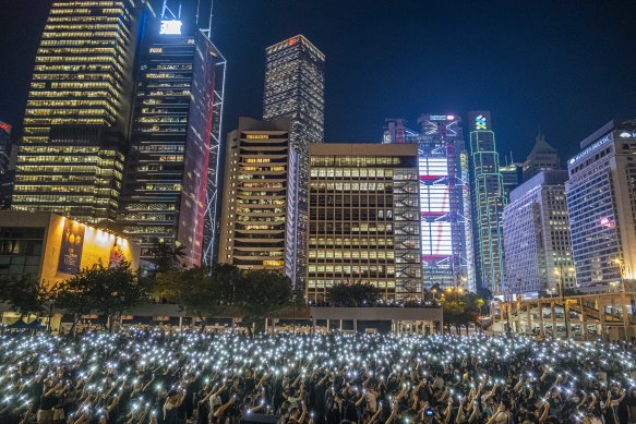 A rally of students in support of anti-government protesters in the Central district of Hong Kong, August 22, 2019. 