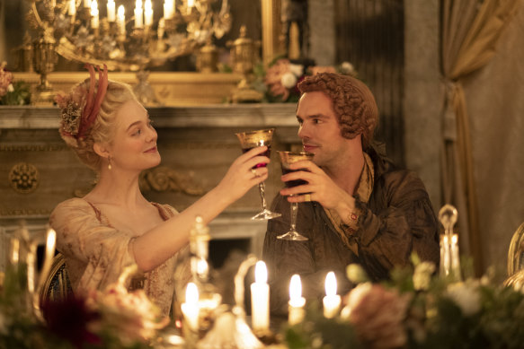 Catherine (Elle Fanning) takes her first steps toward a coup against Peter (Nicholas Hoult) in The Great. 