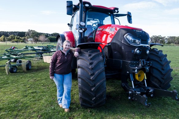 Annameike Cozens on the family farm with her shiny new tractor.