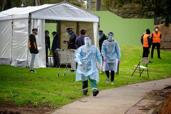 A testing site is set up at the public housing tower on Racecourse Road in Flemington 