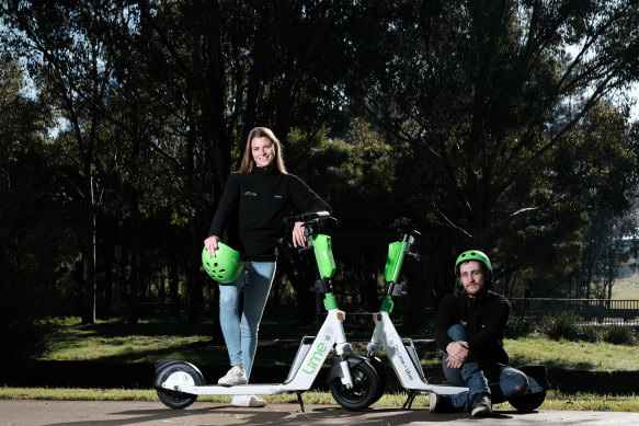 Lime’s Ellen Black and Mark Brodie with rental e-scooters at Lizard Log, one of four locations selected for the NSW government’s e-scooter trial beginning this Saturday.