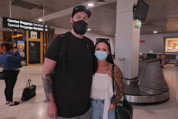 Michael Daffy and Justina Bryan at the Qantas terminal of Melbourne airport on Friday afternoon.