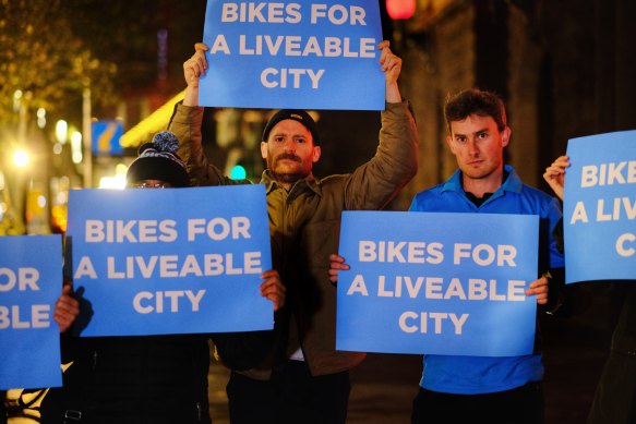 Pro-bike lane protestors outside the Melbourne Town Hall on Tuesday evening.