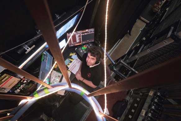 Melbourne Theatre Company crew member Mungo Trumble prepares for <i> Fun Home. 