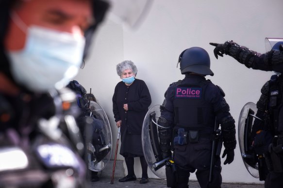 A woman caught up in protests outside Northcote Plaza on Friday.