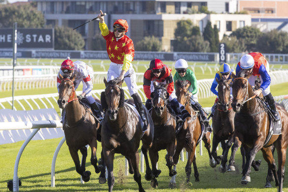 James McDonald salutes after piloting Captivant to victory in the Champagne Stakes.