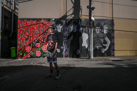 Sheppard with the Nick Cave and the Birthday Party mural.