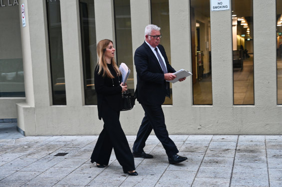Former WA Treasurer Troy Buswell leaves court after the first day of a trial covering three assaults and three common assaults he allegedly committed.
