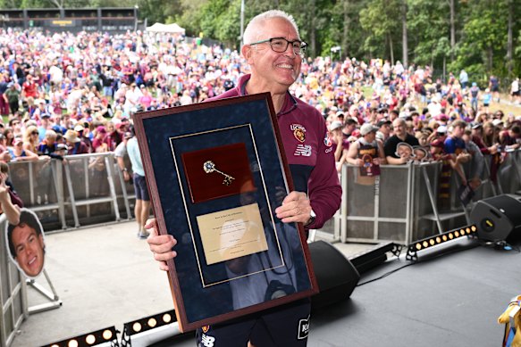 Brisbane Lions coach Chris Fagan with the keys to the city.
