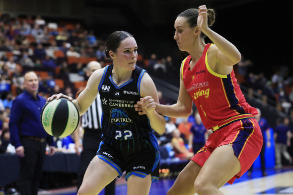 The Capitals’ Kelly Wilson (left) reaches a big WNBL milestone this weekend.