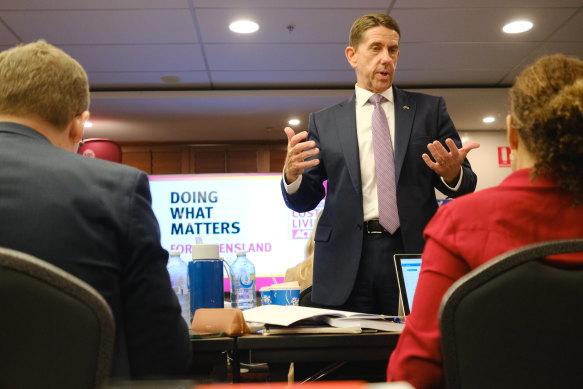 Queensland Treasurer Cameron Dick explaining details of the budget to journalists.