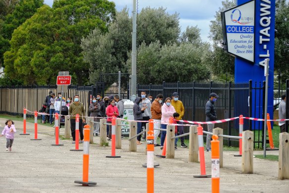 People line up for testing at Al-Taqwa College in Melbourne’s west. 