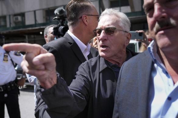 Robert De Niro argues with a Trump supporter after speaking to reporters in support of Joe Biden.