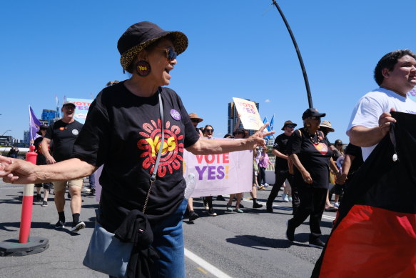 Yes vote supporters march through Brisbane on Sunday. Organisers estimated 20,000 people marched; police put the number at 5000.