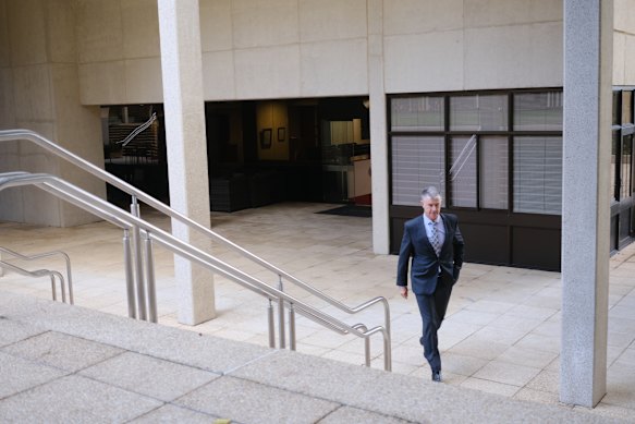 Tim Mander arriving for a press conference at parliament late on Wednesday – his first in Brisbane since scrutiny of his personal life and public role began.