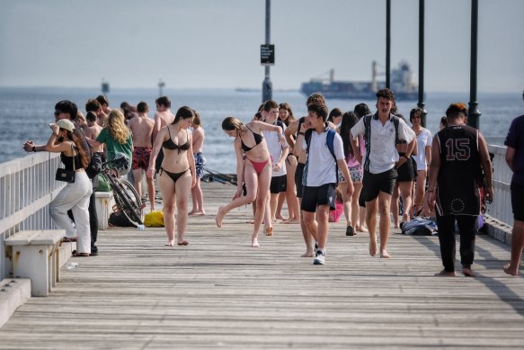 Teenagers in South Melbourne on Tuesday.