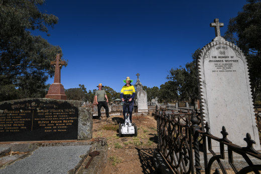 Rod Hitchcock, left, and Dave Hunter at Colbinabbin Cemetery.