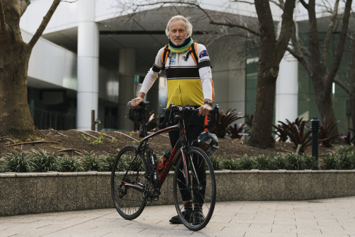 John Hunt cycles to work in Chatswood.