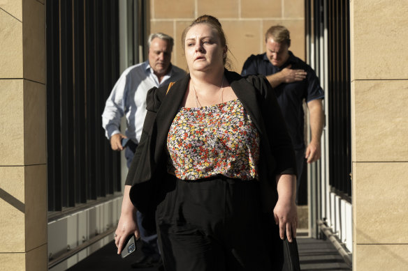 Former ATO Deputy Commissioner Michael Cranston, left, with daughter, Lauren Cranston, centre, at Darlinghurst Court.