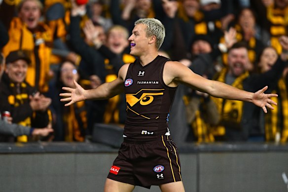 Jack Ginnivan plays it up to the crowd after the Hawks’ win over the Bulldogs.