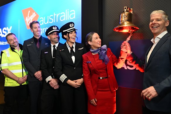 CEO Dave Emerson and Virgin Australia employees at the ASX.