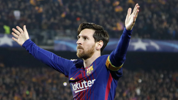 Barcelona's Lionel Messi celebrates his second, and the team's third, goal against Chelsea.