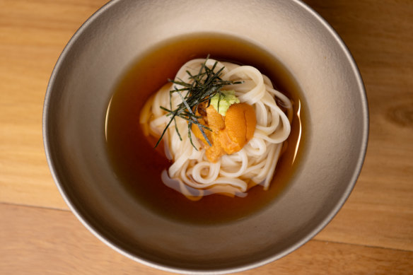 Thin udon noodles crowned with sea urchin and wasabi.