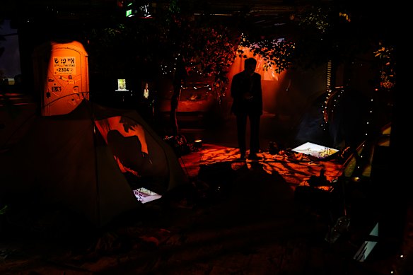 A man walks through a recreation of the site, built with actual tents and belongings found at the scene of the attack, at the Nova Exhibition, “06:29AM - The Moment Music Stood Still” in London, England. The exhibition opens in London on May 20 for six weeks, inviting visitors to reflect as they step into a recreation of the Nova Music Festival site, where 413 people were killed during the October 7, 2023 Hamas attacks on Israel. The installation provides a timeline of the horrific events that unfolded that day, amid actual staging, vehicles, and discarded personal items from the festival site. 