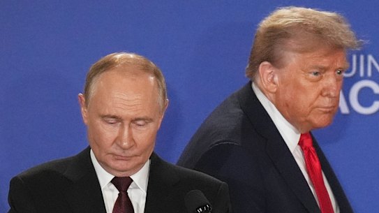 President Donald Trump, right, Russia’s President Vladimir Putin arrive for a joint press conference at Joint Base Elmendorf-Richardson, Alaska, Friday, Aug. 15, 2025. (AP Photo/Jae C. Hong)