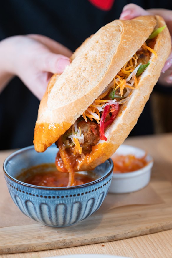 Xiu-mai meatball sub with dipping sauce.