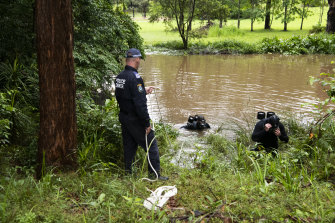 NSW Police divers search a creek for the remains of William Tyrrell on Thursday. 
