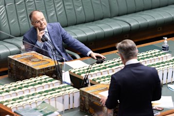 Opposition energy spokesman Ted O’Brien listening to Climate Change and Energy Minister Chris Bowen. 