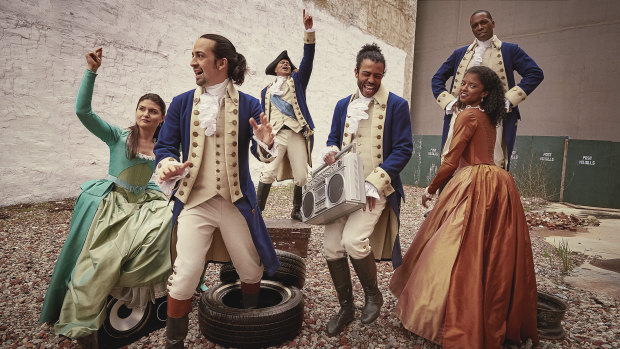 Lin-Manuel Miranda (second from left) and other members of the original Hamilton cast.