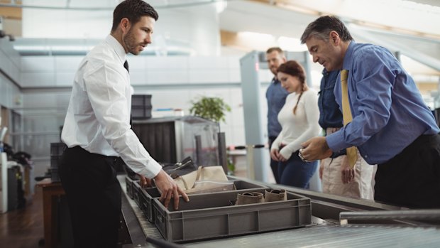 Plastic security screening bins could have as much as a 50 per cent chance of carrying cold viruses during flu season, Finnish and British researchers say.