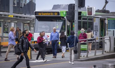 Commuters outside Melbourne’s Flinders Street Station on Monday.