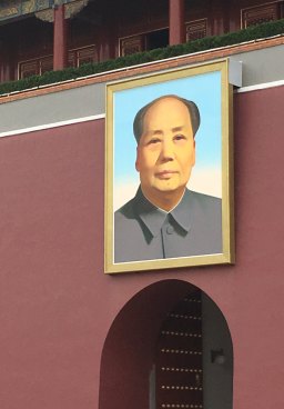 The image of Mao looms in Tiananmen Square.