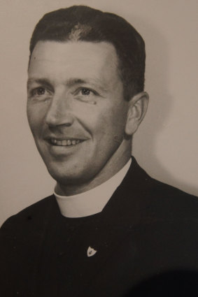 Peter Robinson in his early days as a priest.