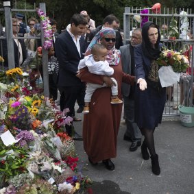 Jacinda Ardern pays her respects at a Wellington mosque after the Christchurch mosque shootings last year. 