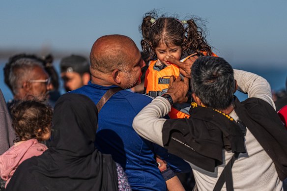 A small child prepares to make the Channel crossing.