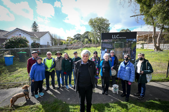 Ian Hundley (centre) and other residents outside a property where a tree was illegally removed in Balwyn North.